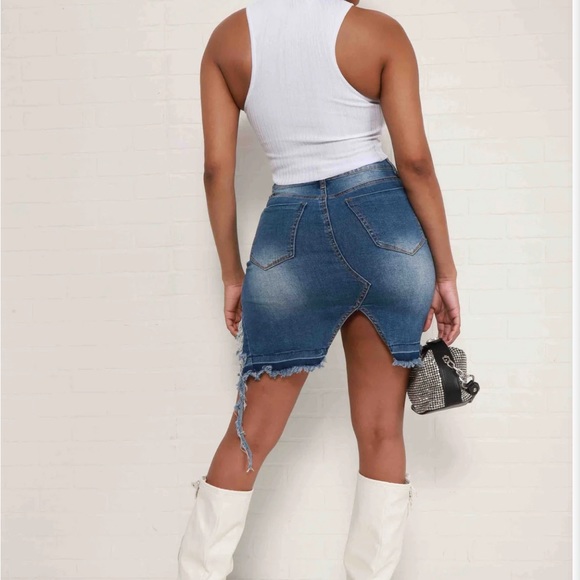 Asymmetrical distressed denim skirt. Size Medium (6-8). Never worn. - Picture 2 of 4